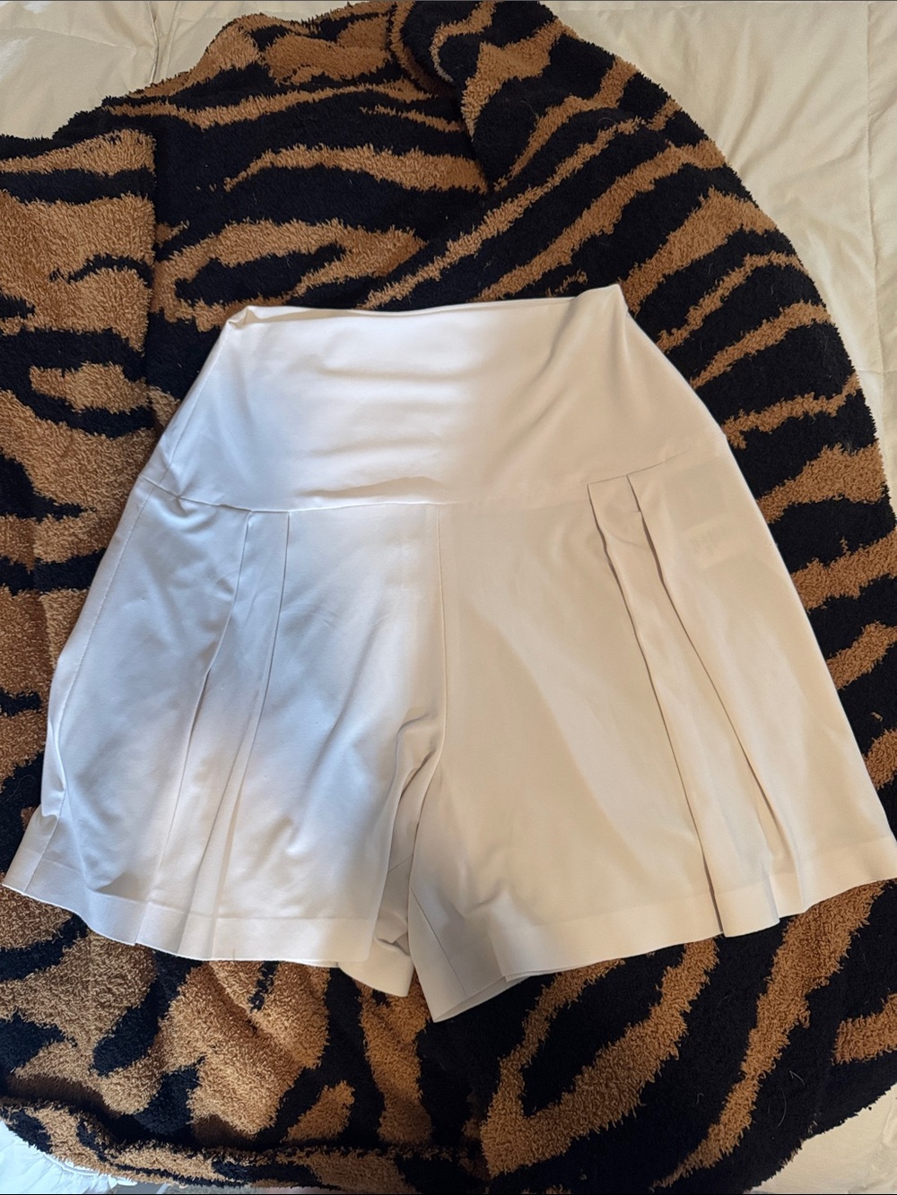 Norma Kamali White High-Waist Pleated Shorts